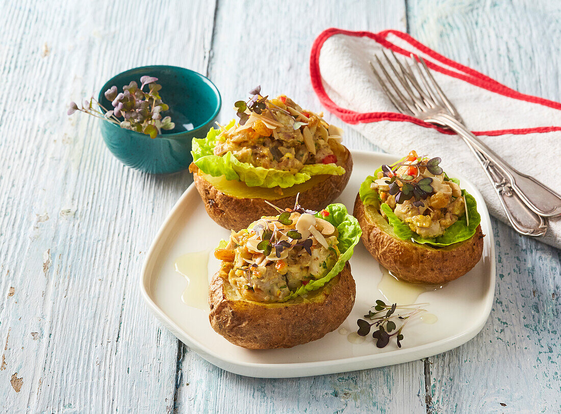 Baked potatoes stuffed with chicken