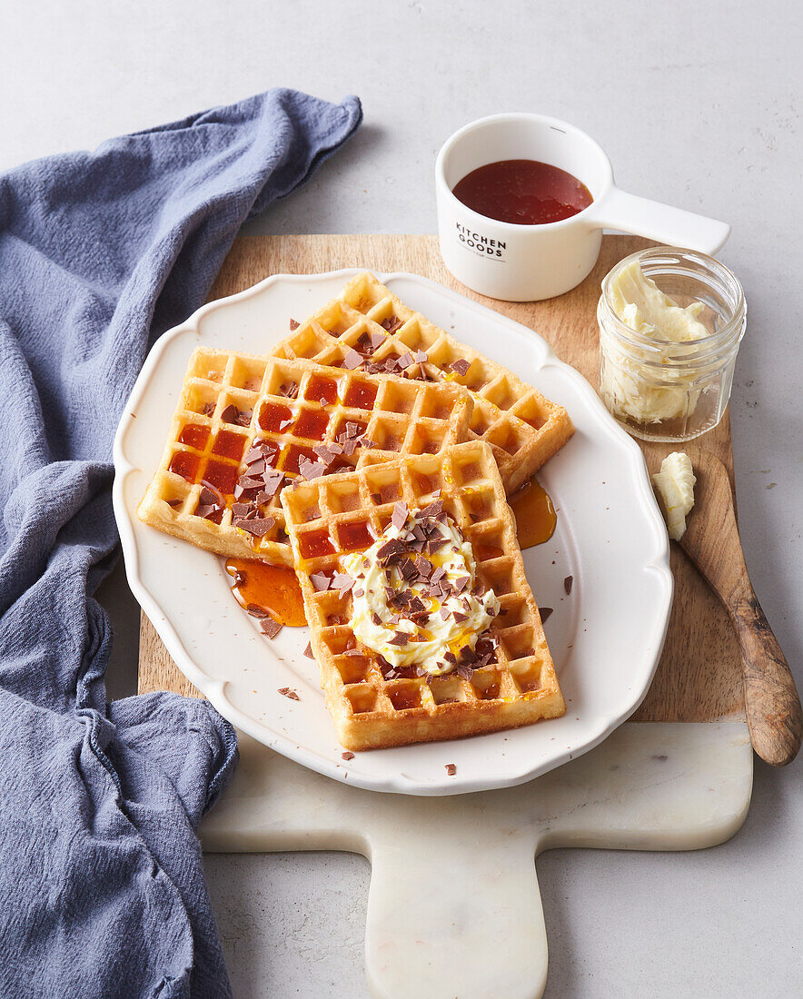 Waffles with butter and maple syrup