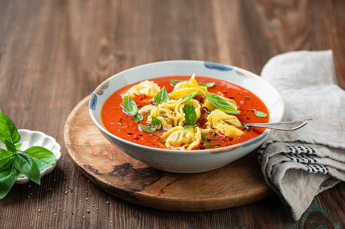 Creamy vegan tomato soup with ravioli