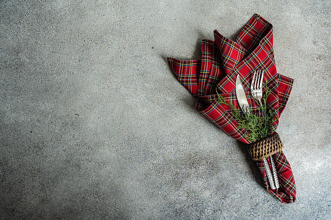 Chequered cloth napkin with Christmas decoration