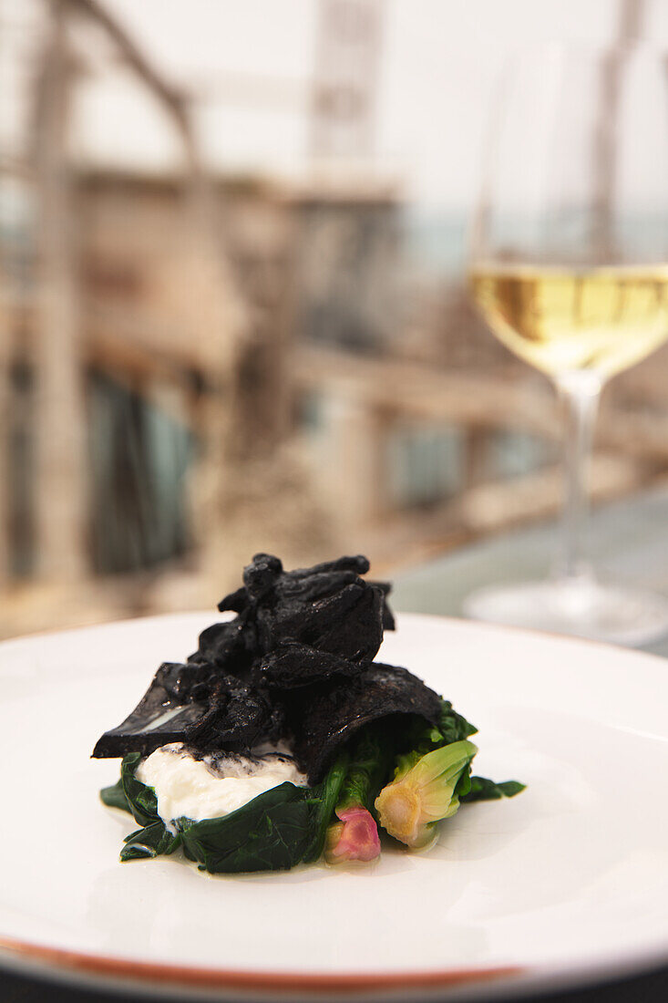 Squid with spinach and stracciatella cheese (Puglia)