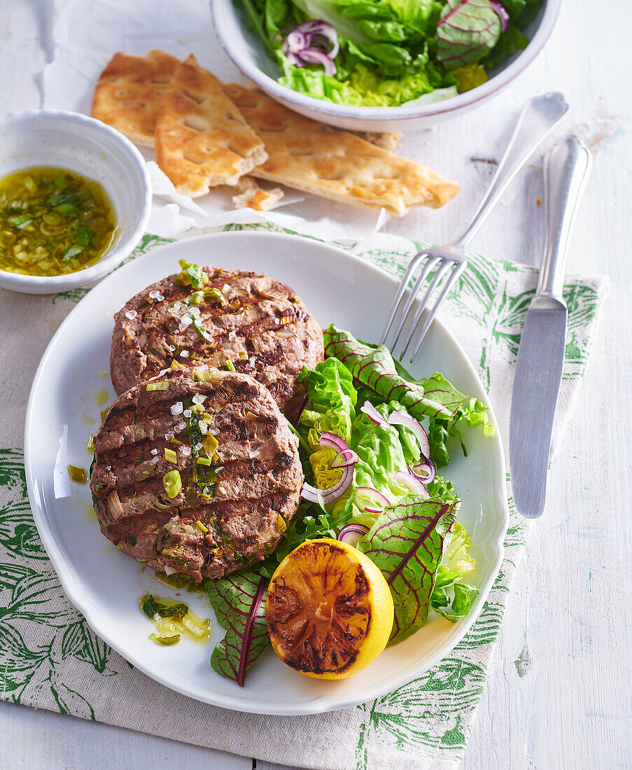 Grilled burgers with lemon balm sauce
