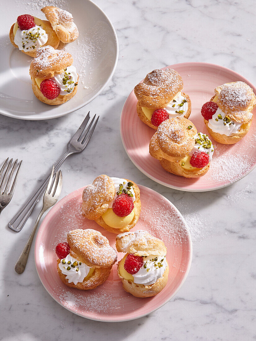 Lemon curd puffs with raspberries