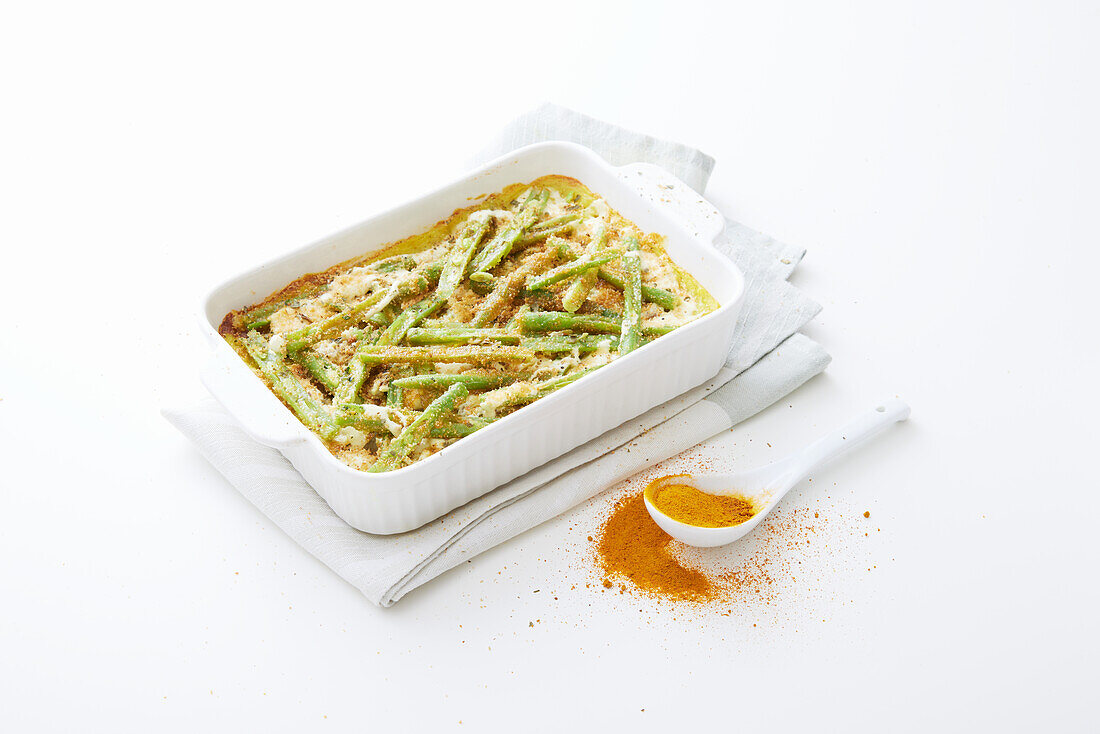 Curried bean casserole with yogurt cream