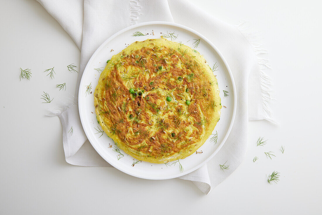 Pea omelette with fennel seeds