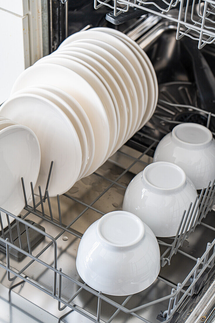 White dishes in the dishwasher