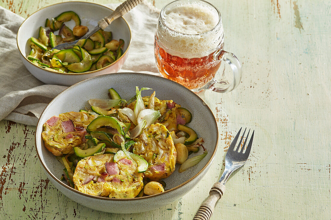 Potato dumplings with smoked meat and zucchini