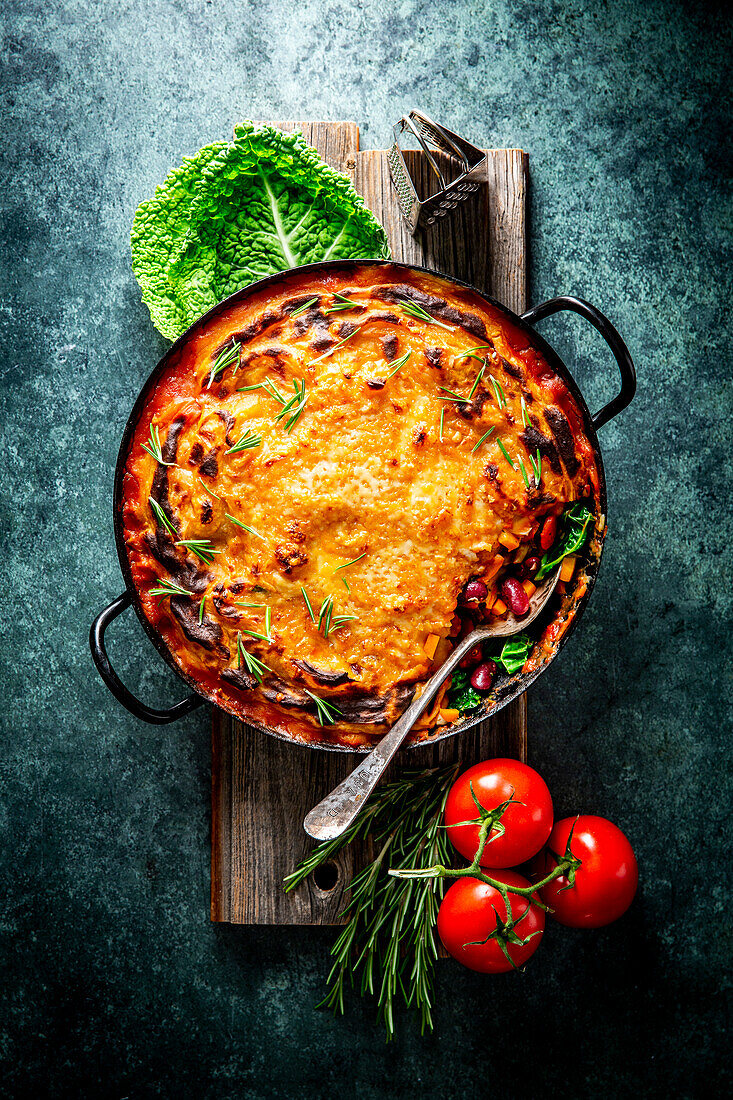 Sweet potato and kidney bean pie with kale and cheddar cheese