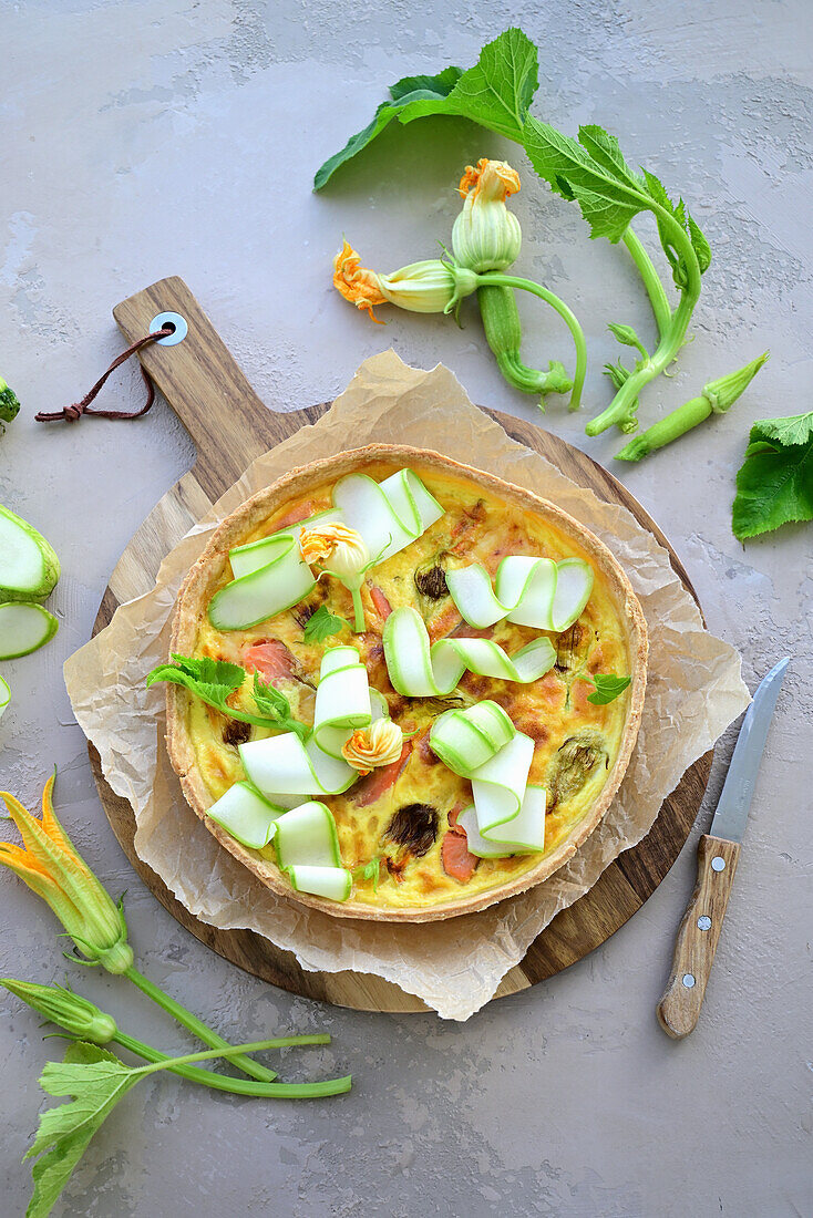 Tart with salmon and squash flowers