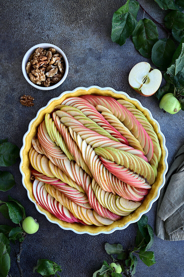 Apple tart with caramel and walnuts (unbaked)