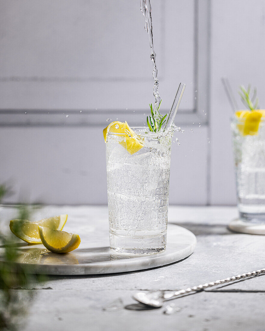 Gin and tonic with rosemary and lemon zest