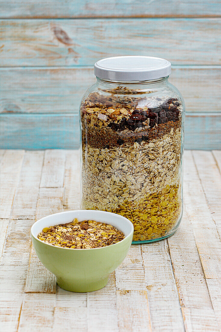 Muesli in a bowl and in a storage jar