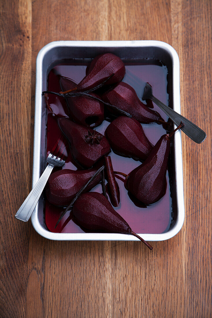 Pears, pickled in red wine