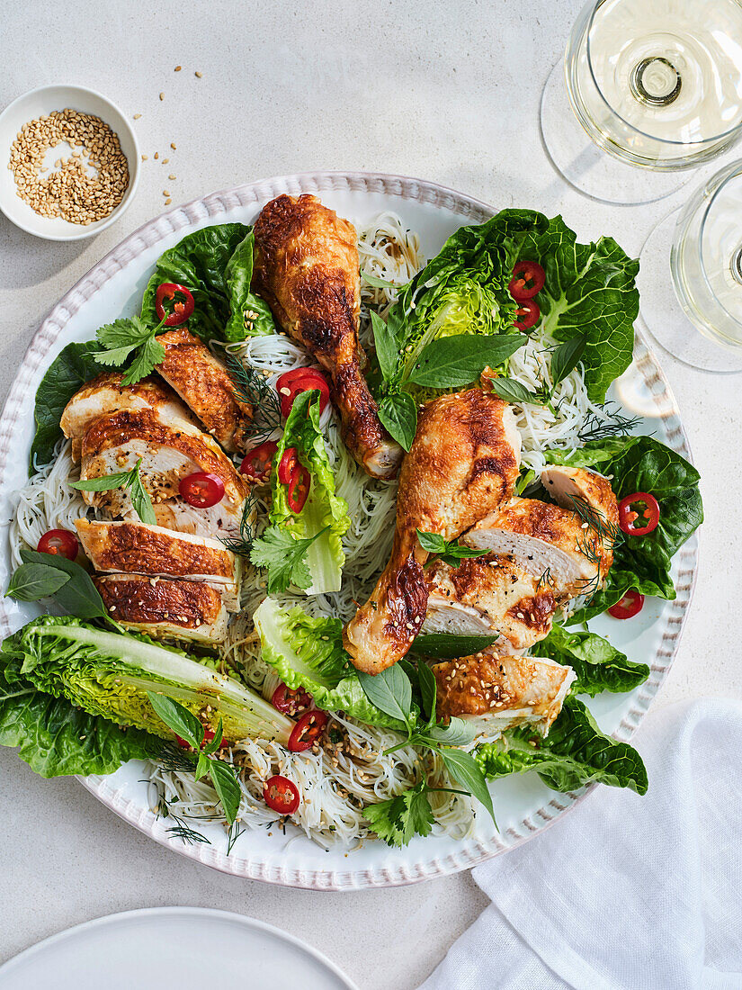 Asian rice noodle salad with chicken and herbs