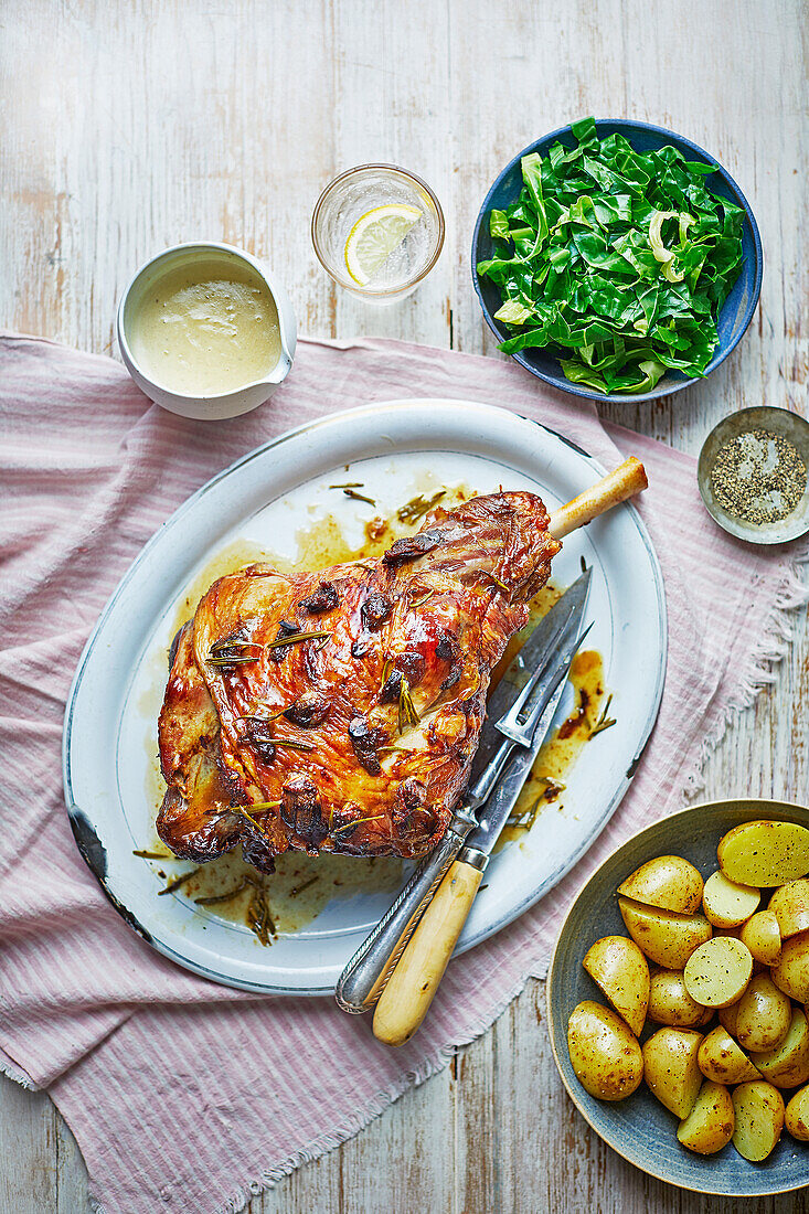 Leg of lamb with anchovy cream, potatoes and salad