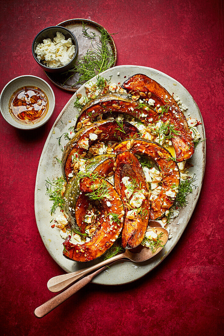 Roasted squash with pomegranate, dill, feta and chili oil