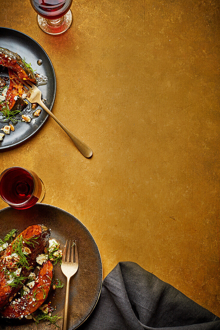 Roasted squash with pomegranate, dill, feta and chili oil