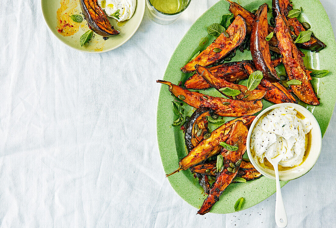 Harissa eggplant wedges with tahini and mint yogurt