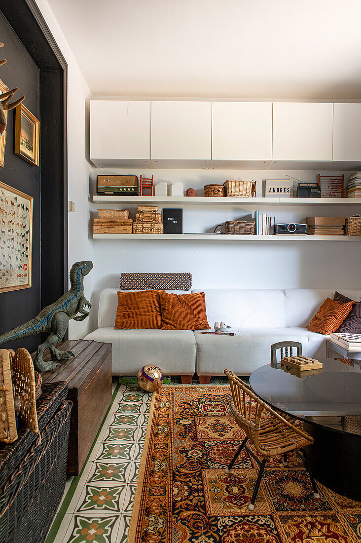 Living room with retro decor and oriental rug