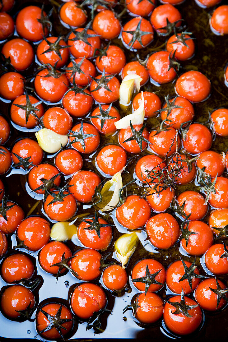 Pickled cherry tomatoes with garlic and thyme