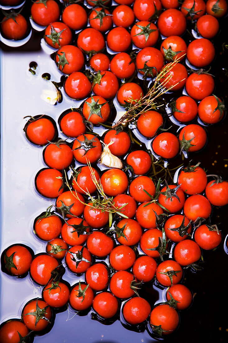 Pickled cherry tomatoes with garlic and thyme