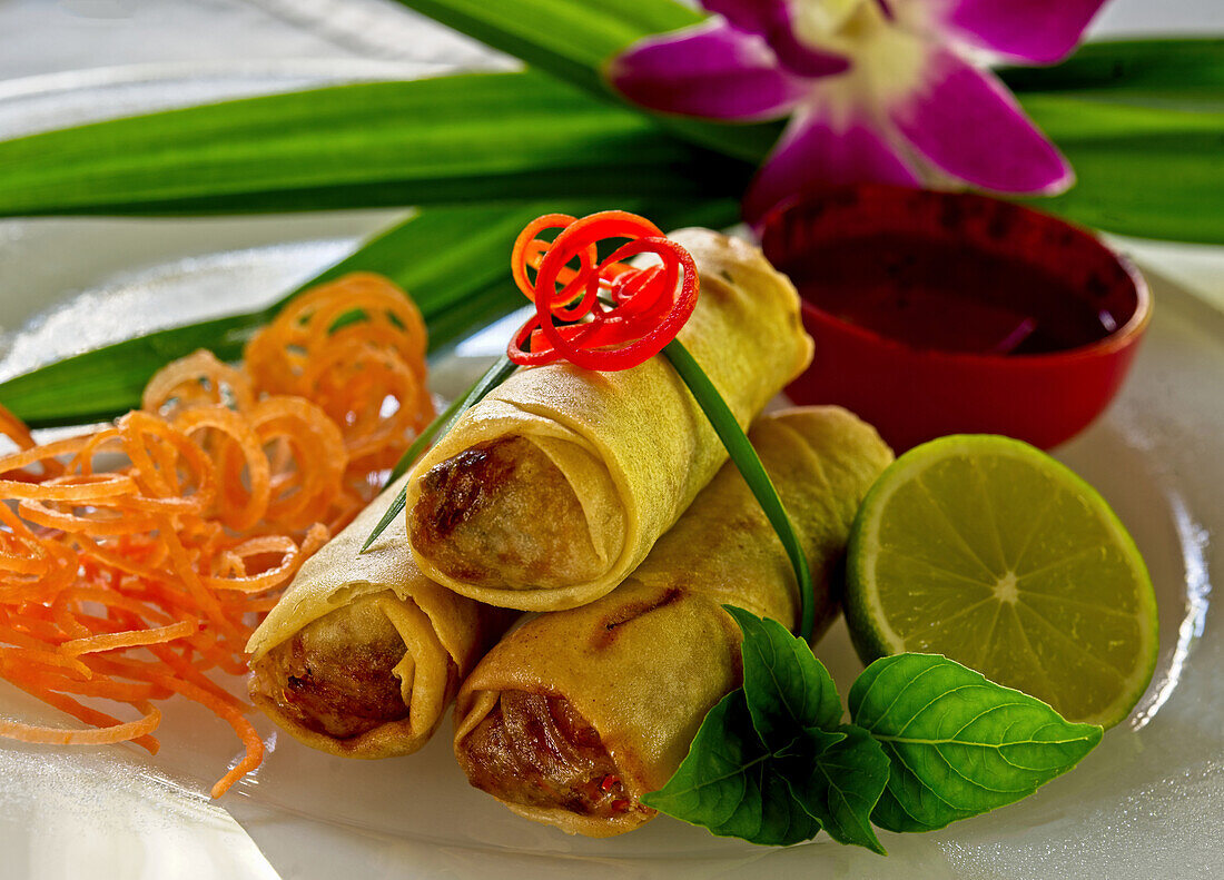 Spring rolls with lobster, vegetables, lime and Thai basil