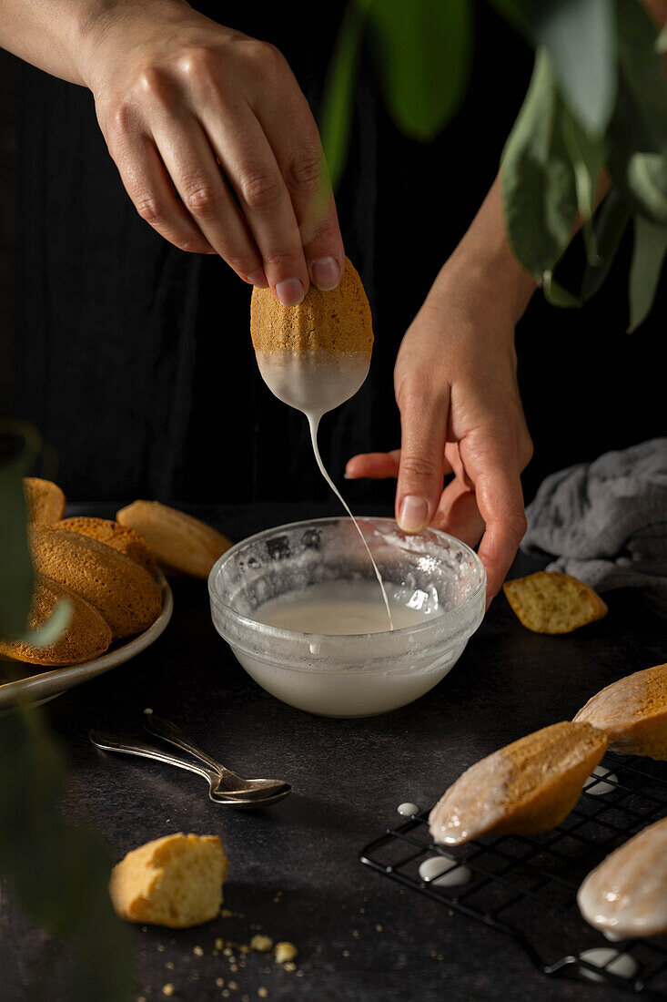 Dipping Madeleines in Icing