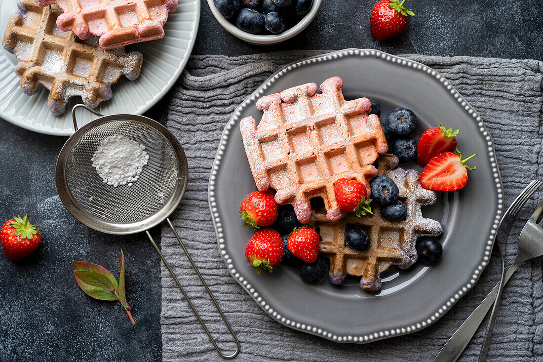 Homemade strawberry waffles and blueberry waffles