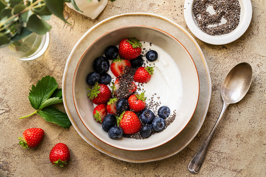 Breakfast bowl with yogurt, berries and chia seeds