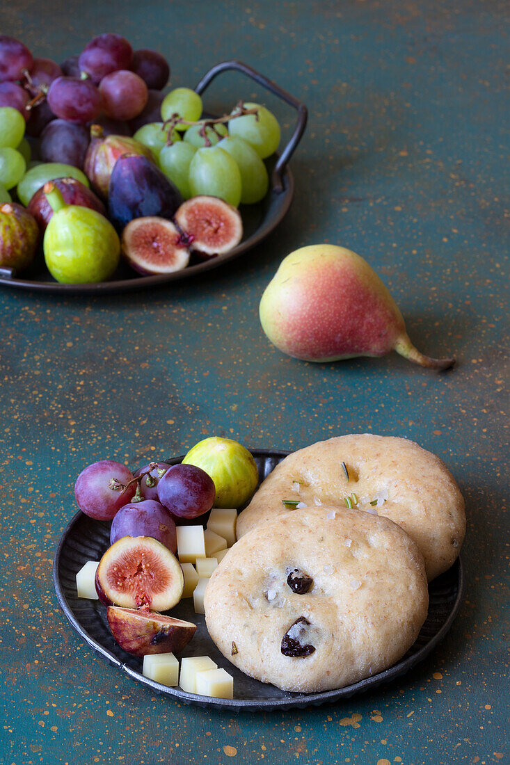 Focaccine with black olives and walnuts