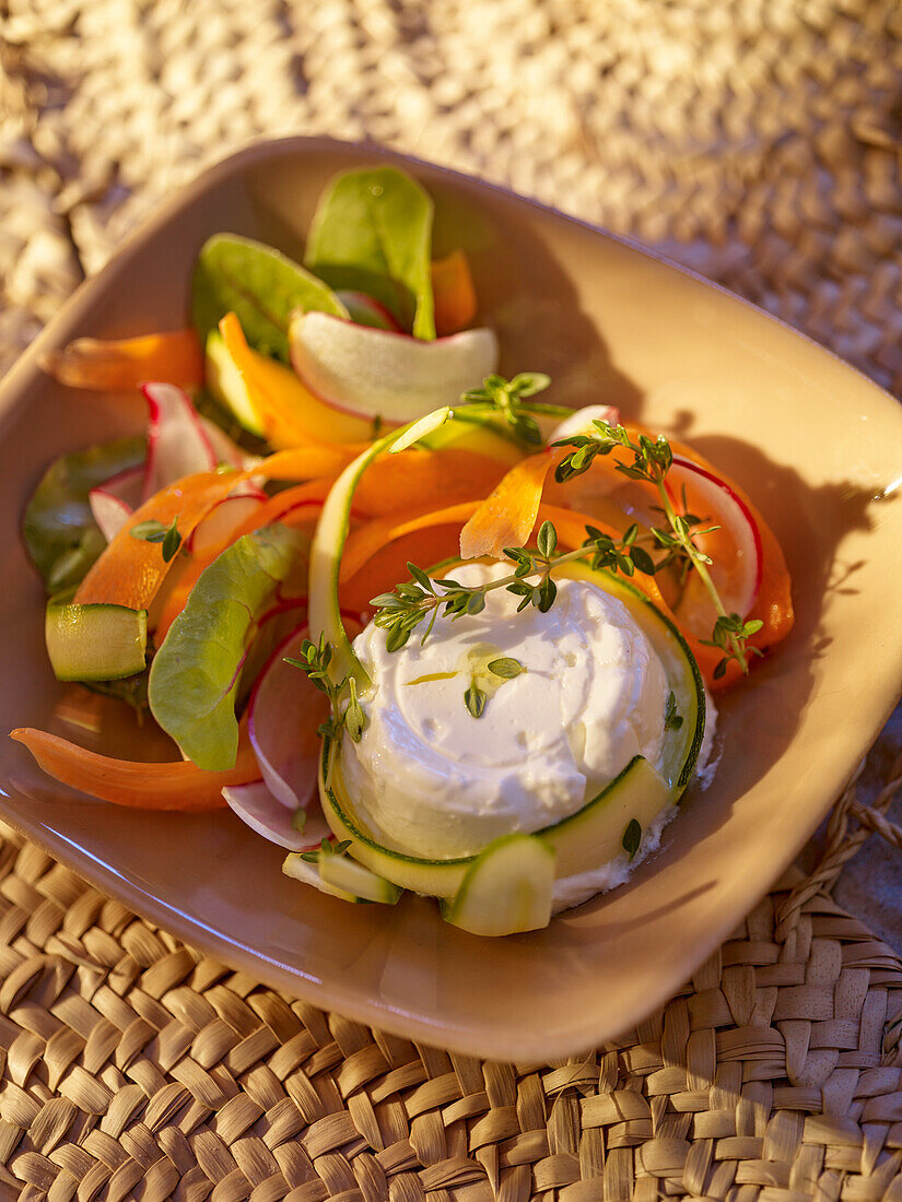 Mixed raw vegetable salad with cream cheese