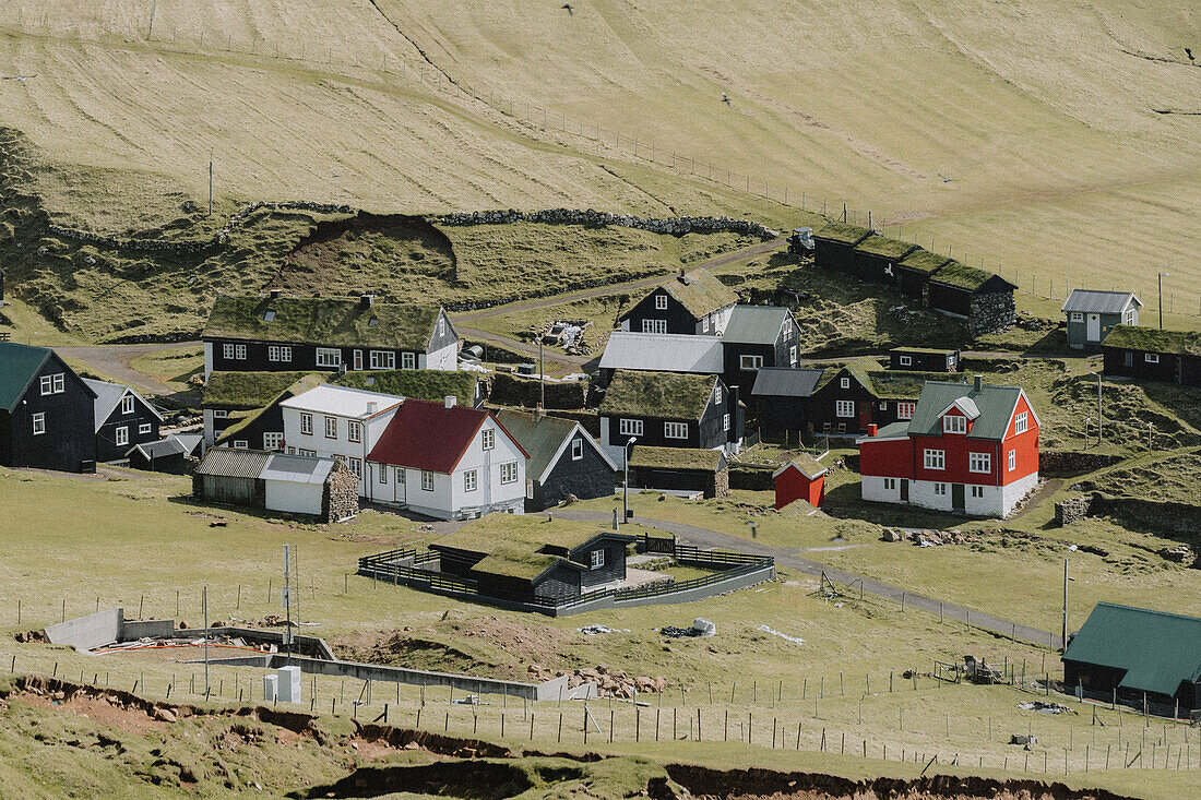 Houses in sunny village, Mykines, Faroe Islands\n
