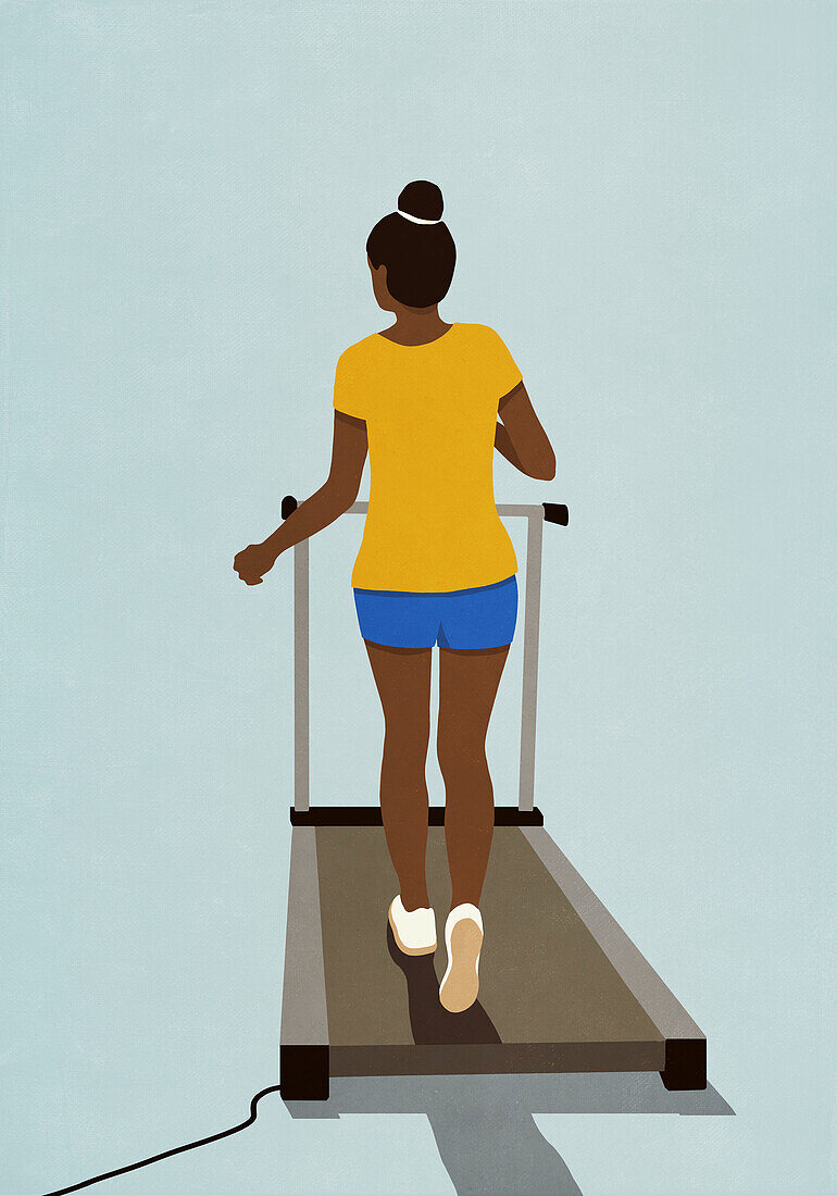 Woman exercising, walking on treadmill\n