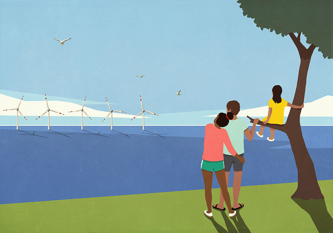 Gelassene Familie schaut auf Windräder im sonnigen Meer
