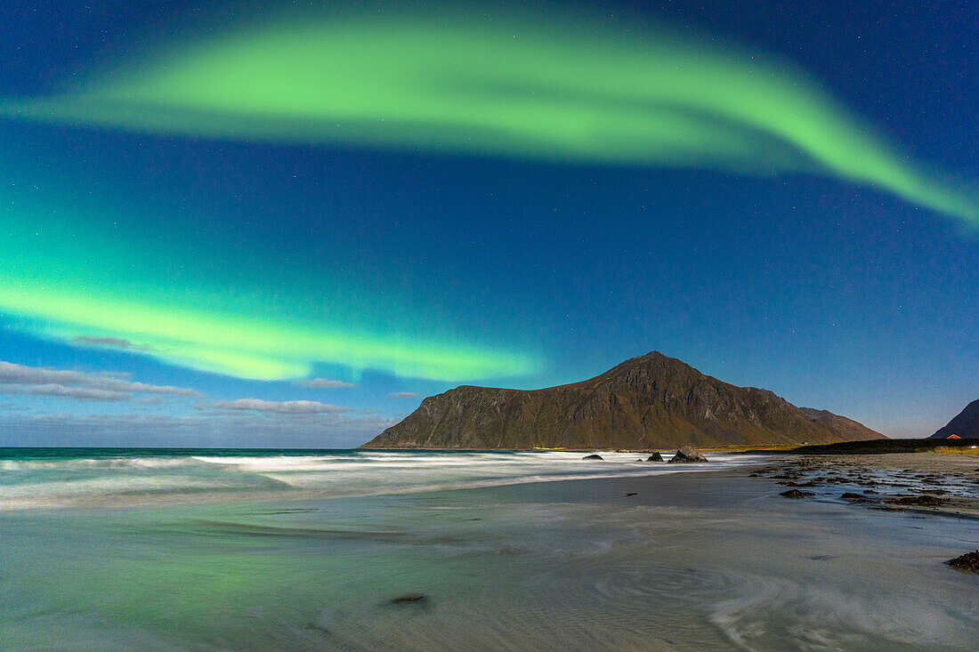 Aurora Borealis (Northern Lights) over the frozen Skagsanden beach, Ramberg, Lofoten Islands, Nordland, Norway, Scandinavia, Europe\n