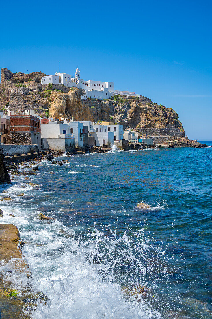 View of Virgin Mary Spiliani Monastery above the town of Mandraki, Mandraki, Nisyros, Dodecanese, Greek Islands, Greece, Europe\n