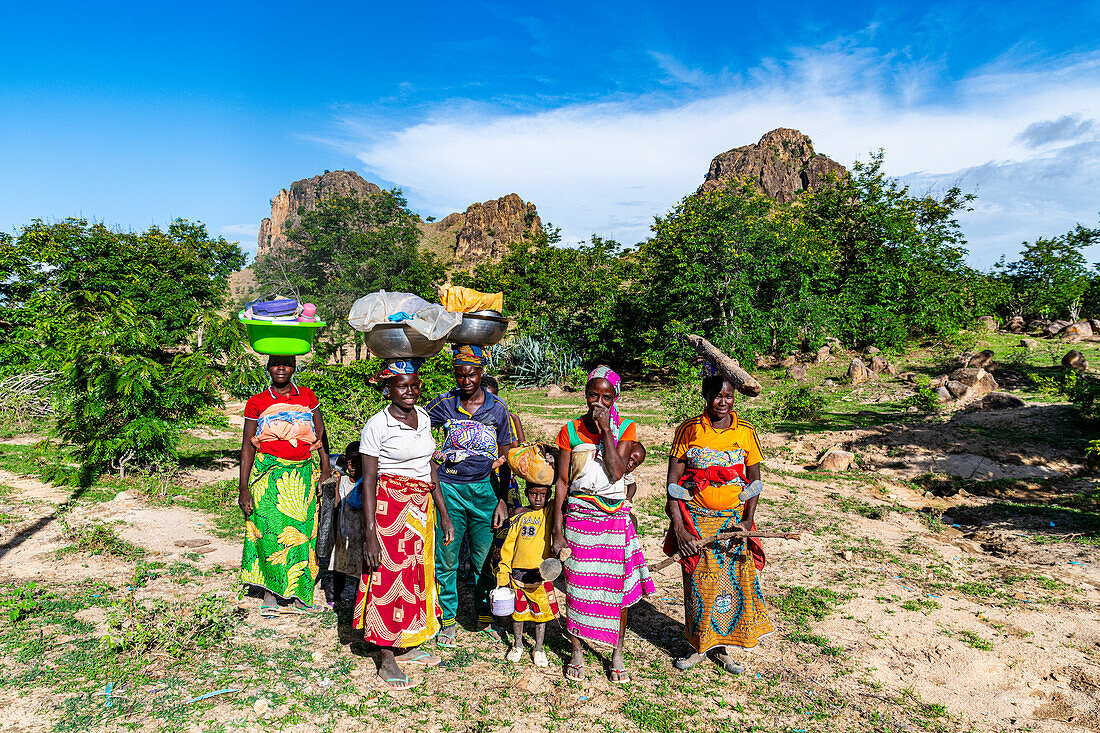 Kapsiki women coming back from the fields, Rhumsiki, Mandara mountains, Far North province, Cameroon, Africa\n