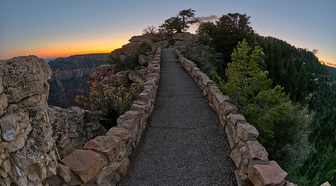 The paved pathway between Bright Angel Point and the visitor center at Grand Canyon North Rim at twilight, Grand Canyon National Park, UNESCO World Heritage Site, Arizona, United States of America, North America\n