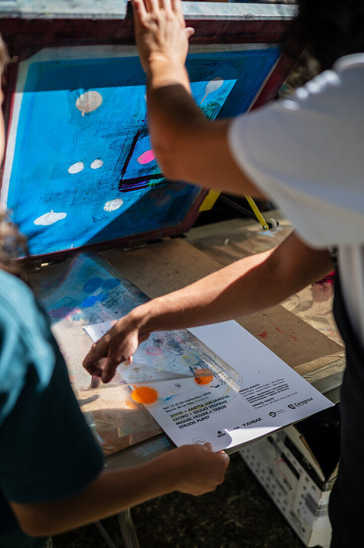 DIY posters with Natalia Royo from Tintaentera at Asalto International Urban Art Festival in Zaragoza, Spain\n