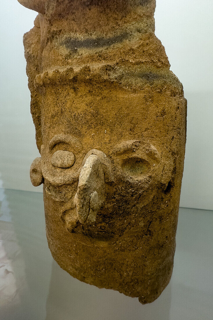 A Mayan ceramic effigy censor in the visitors center museum in the Cahal Pech Archeological Reserve in San Ignacio, Belize.\n