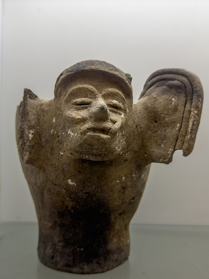 A Mayan ceramic effigy censor in the visitors center museum in the Cahal Pech Archeological Reserve in San Ignacio, Belize.\n