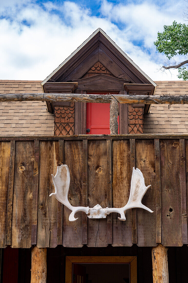 Moose antlers on the front of the Old House at Center and Main in Torrey, Utah. Built about 1900 and now a gift shop.\n