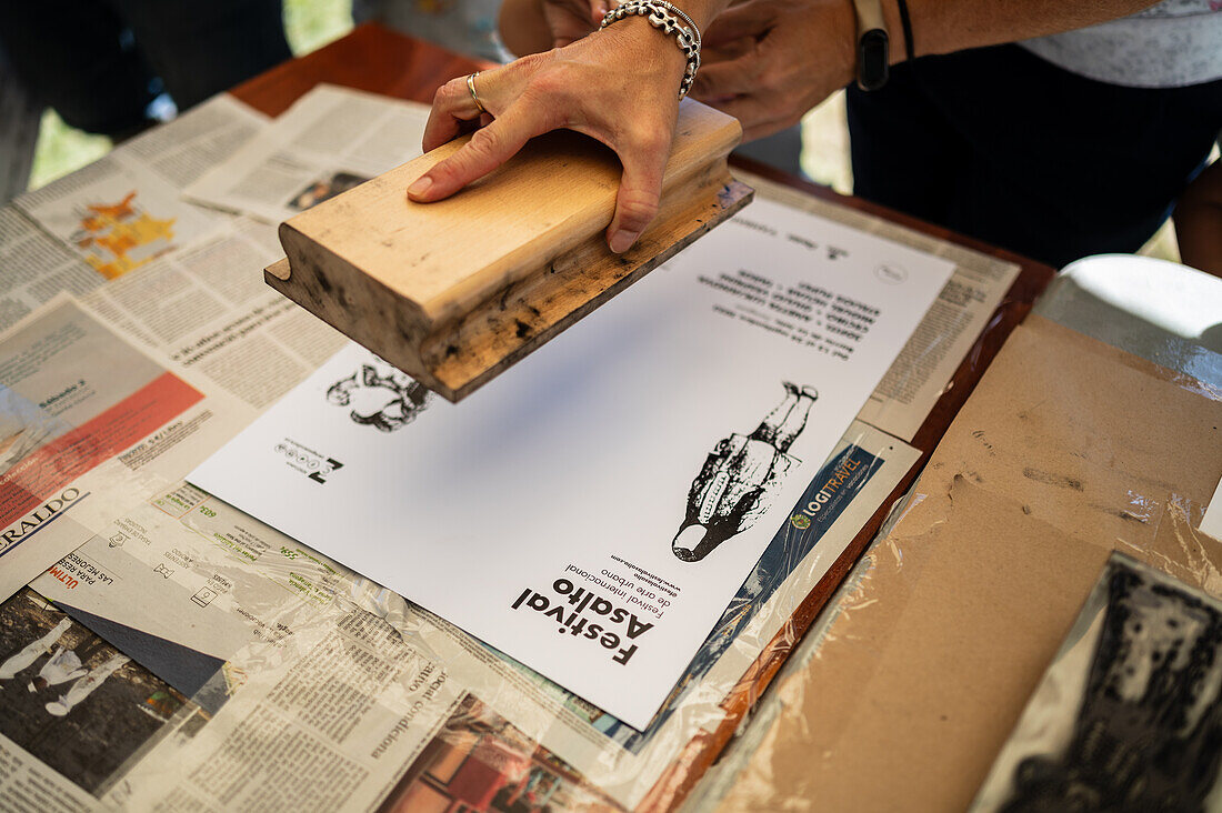 DIY posters with Natalia Royo from Tintaentera at Asalto International Urban Art Festival in Zaragoza, Spain\n