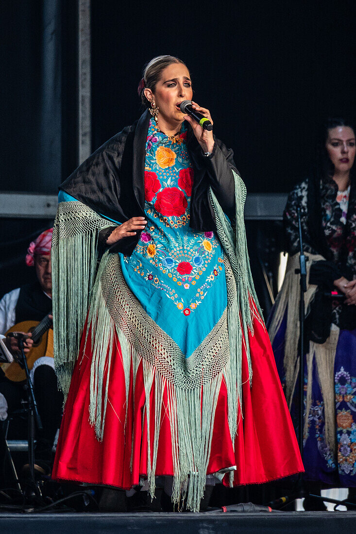 Baluarte Aragones and Raices de Aragon, Aragonese traditional Jota groups, perform in Plaza del Pilar during the El Pilar festivities in Zaragoza, Spain\n