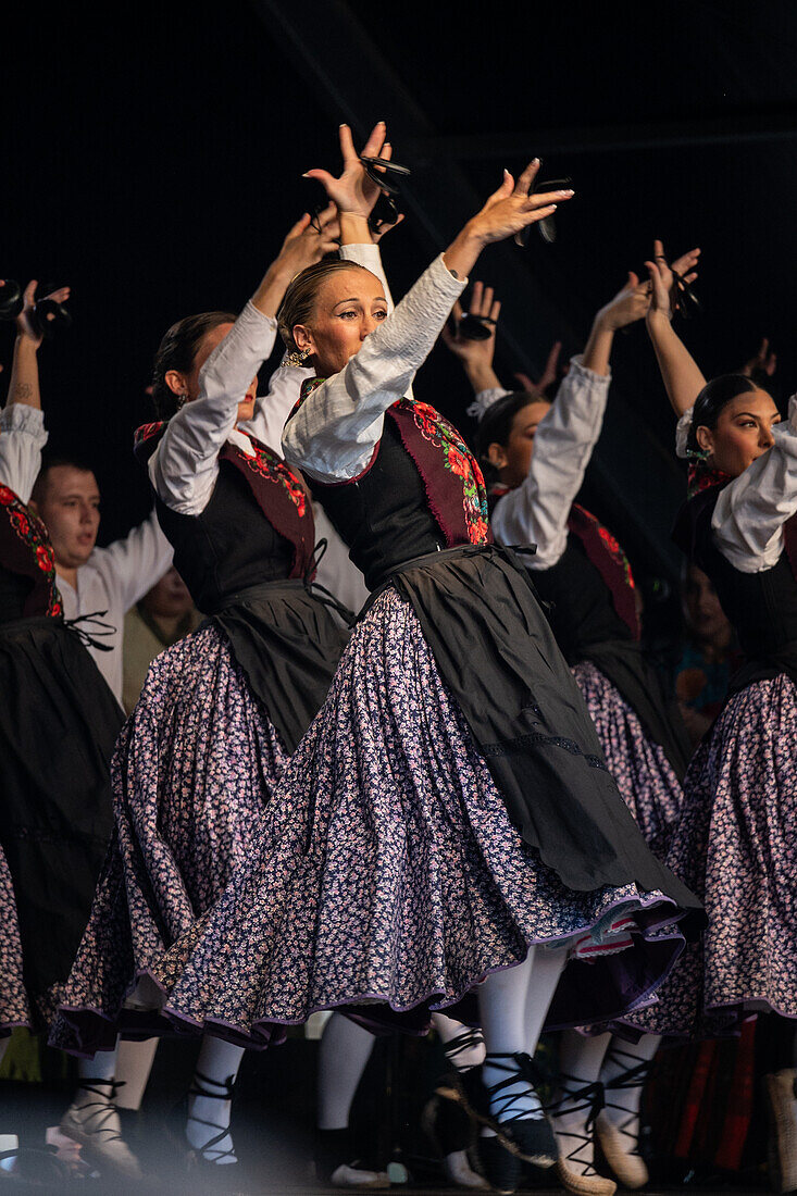 Baluarte Aragones and Raices de Aragon, Aragonese traditional Jota groups, perform in Plaza del Pilar during the El Pilar festivities in Zaragoza, Spain\n