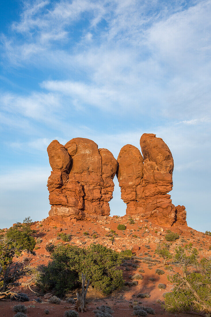 Entrada sandstone towers on the High Spur in the Orange Cliffs of the Glen Canyon National Recreation Area in Utah.\n