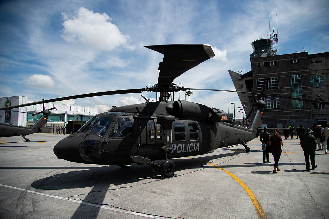 A UH60 Black Hawk is parked on the apron during an event at the CATAM - Airbase in Bogota, where the United States of America embassy in Colombia gave 3 Lockheed Martin UH60 Black Hawks to improve the antinarcotics operations, on September 27, 2023.\n