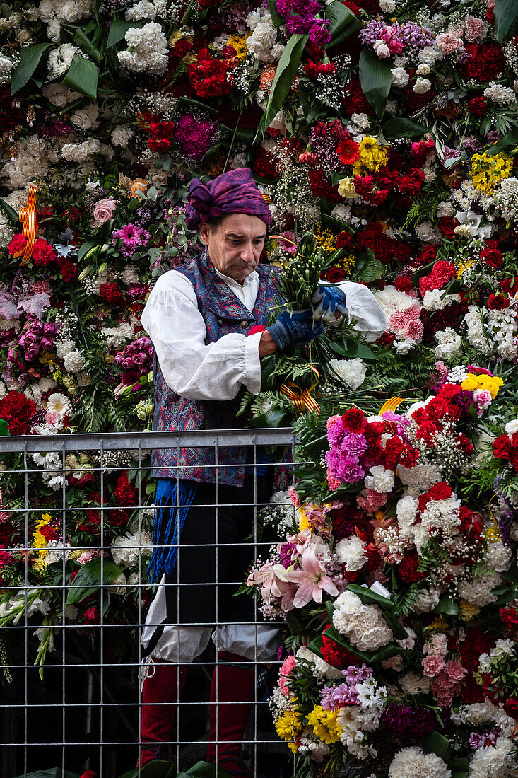 The Offering of Flowers to the Virgen del Pilar is the most important and popular event of the Fiestas del Pilar held on Hispanic Day, Zaragoza, Spain\n