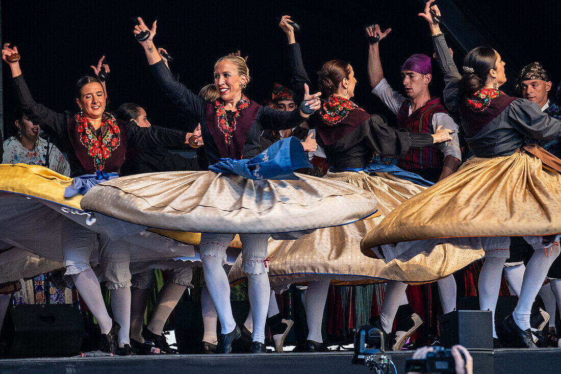Baluarte Aragones and Raices de Aragon, Aragonese traditional Jota groups, perform in Plaza del Pilar during the El Pilar festivities in Zaragoza, Spain\n
