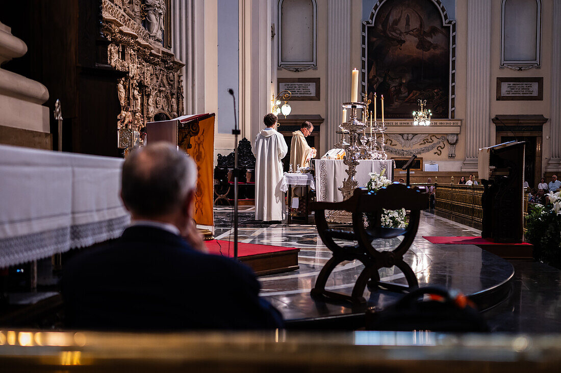 Believers inside the Cathedral-Basilica of Our Lady of the Pillar during The Offering of Flowers to the Virgen del Pilar, the most important and popular event of the Fiestas del Pilar held on Hispanic Day, Zaragoza, Spain\n